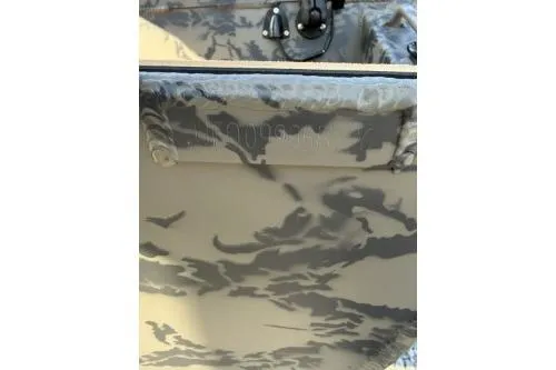 Slide: The Image of 2026 Gator Tail 1854 Extreme boat with camouflage pattern detail. - 15