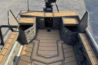 Slide: The Image of 2026 Gator Tail 1854 Extreme boat interior with storage compartments and patterned flooring. - 8