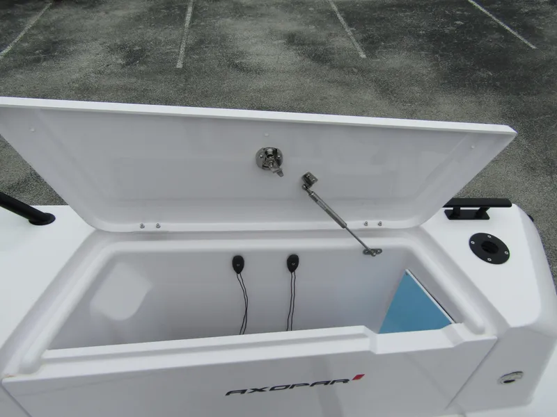 Slide: The Image of Open storage compartment on 2024 Axopar 37XC CROSS CABIN boat. - 33