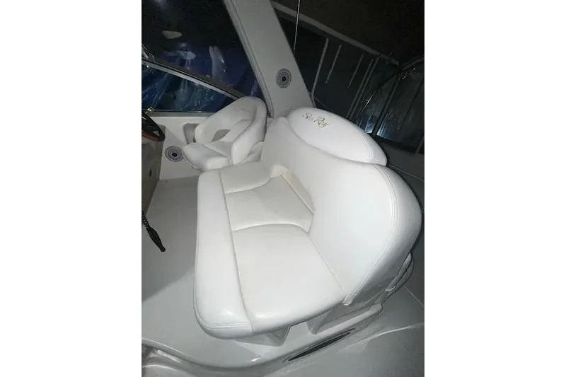 Slide: The Image of White leather seating in 2001 Sea Ray 340 Sundancer boat interior. - 15