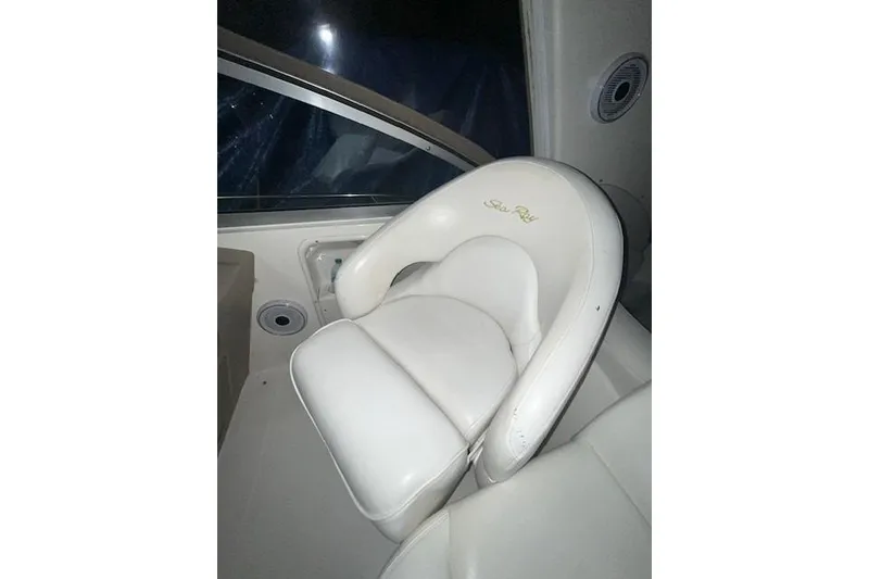 Slide: The Image of White leather seat on 2001 Sea Ray 340 Sundancer boat. - 16