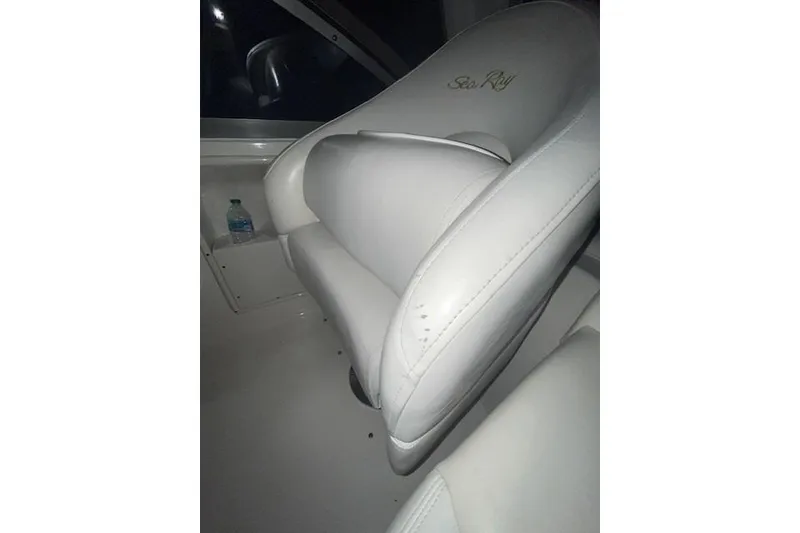 Slide: The Image of White leather seat on 2001 Sea Ray 340 Sundancer boat interior. - 19
