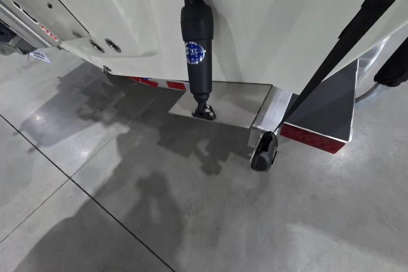 Slide: The Image of 2026 Pathfinder 2200 TRS boat trailer detail in a showroom setting. - 26