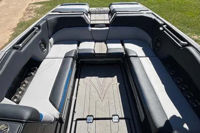 Slide: The Image of 2024 Supra SE 550 boat interior with spacious seating and modern design. - 6