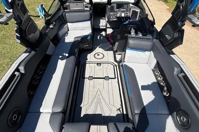 Slide: The Image of 2024 Supra SE 550 boat interior with spacious seating and modern design. - 7