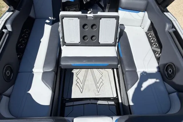 Slide: The Image of 2024 Supra SE 550 boat interior with stylish seating and modern design elements. - 8