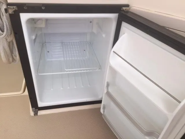 Slide: The Image of Empty fridge on Island Packet Packet Craft Express 360, 2002 model. - 17