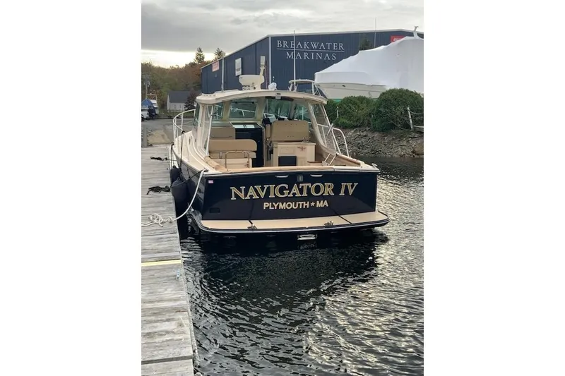Slide: The Image of 2002 Island Packet Packet Craft Express 360 docked at Breakwater Marinas. - 4