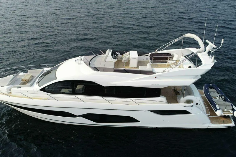 The Image of 2023 Sunseeker Manhattan 68 yacht on open water, showcasing sleek design and luxury features. - 0