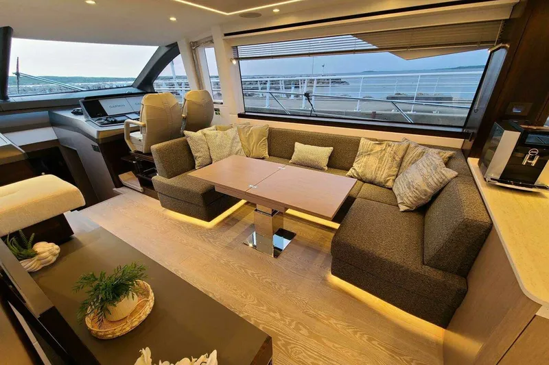 Slide: The Image of Luxurious interior of 2023 Sunseeker Manhattan 68 yacht with elegant seating and scenic view. - 14