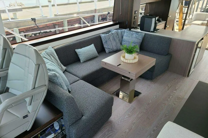 Slide: The Image of Luxurious interior of 2023 Sunseeker Manhattan 68 yacht with modern seating and decor. - 18