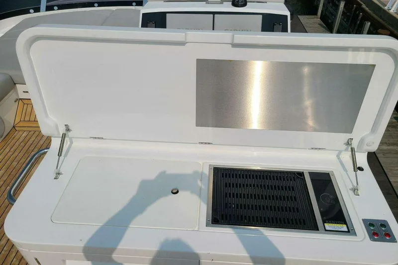 Slide: The Image of Outdoor grill on 2023 Sunseeker Manhattan 68 yacht deck, featuring sleek design and modern amenities. - 43