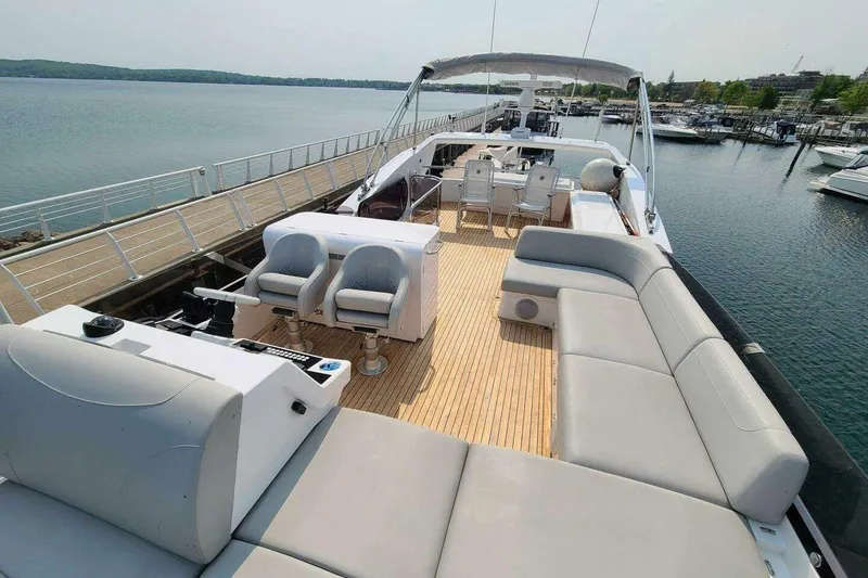 Slide: The Image of Luxurious 2023 Sunseeker Manhattan 68 yacht with spacious deck and elegant seating. - 45