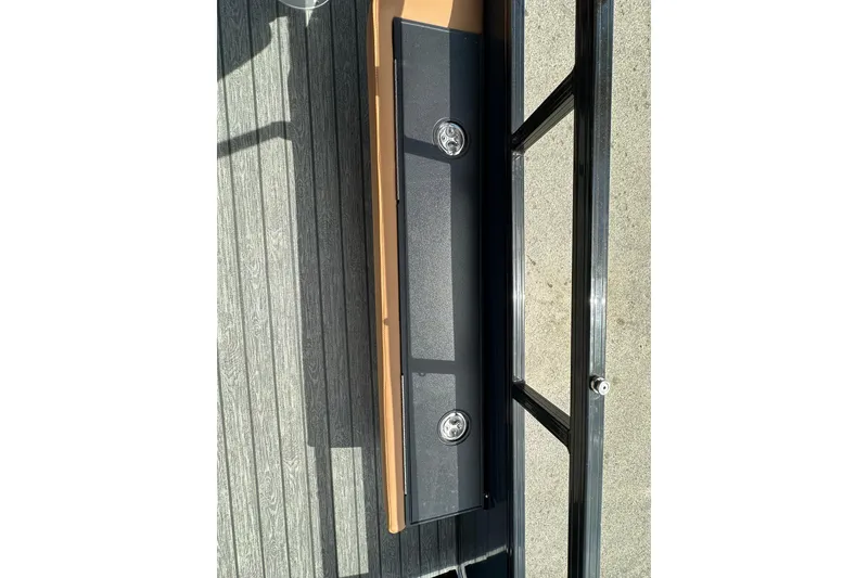 Slide: The Image of 2026 Ranger Reata 223FC boat deck with sleek design and modern fixtures. - 23