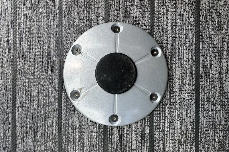 Slide: The Image of Round metal fixture on textured surface, Ranger Reata 223FC, 2026 model. - 36
