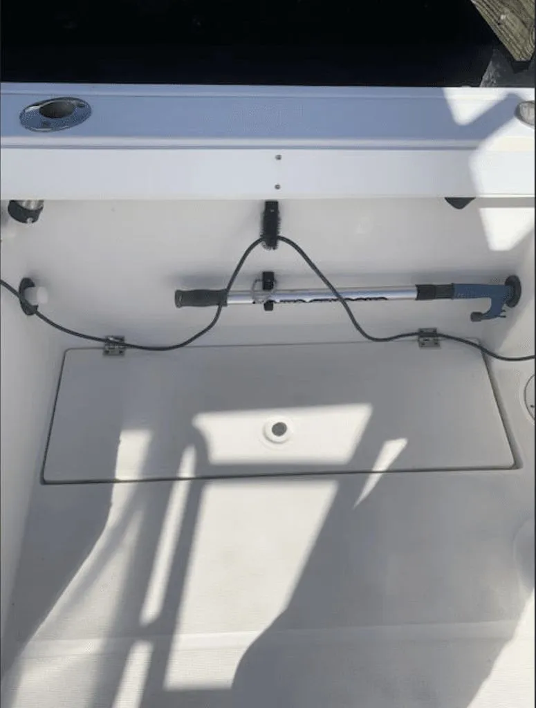 Slide: The Image of Interior of a 2005 Robalo R235 WA boat, clean and well-maintained. - 17