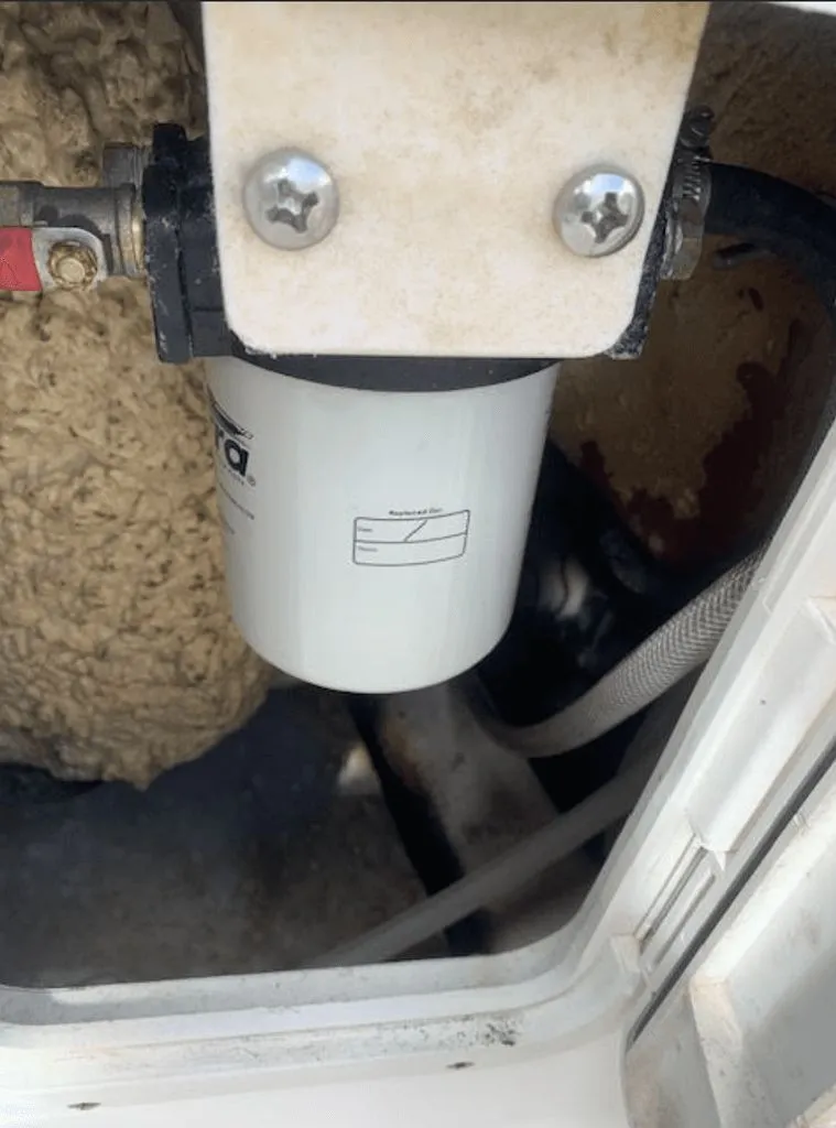 Slide: The Image of Fuel filter in engine compartment of 2005 Robalo R235 WA boat. - 20