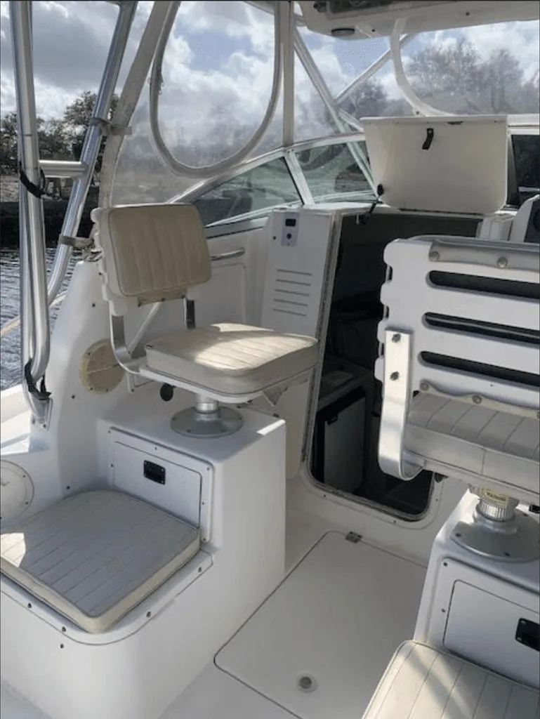 Slide: The Image of Interior of a 2005 Robalo R235 WA boat with seating. - 3