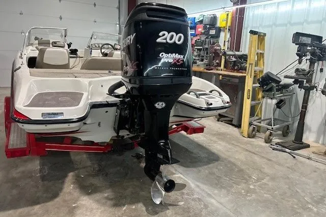 Slide: The Image of 2008 Nitro 189 Sport boat with Mercury 200 OptiMax engine in a garage. - 6