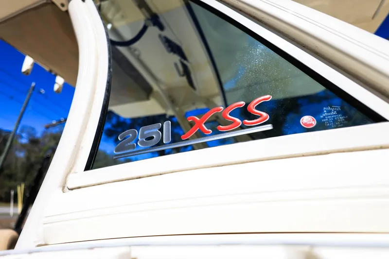 Slide: The Image of 2019 Scout 251 XSS boat dashboard with steering wheel and control panel. - 26