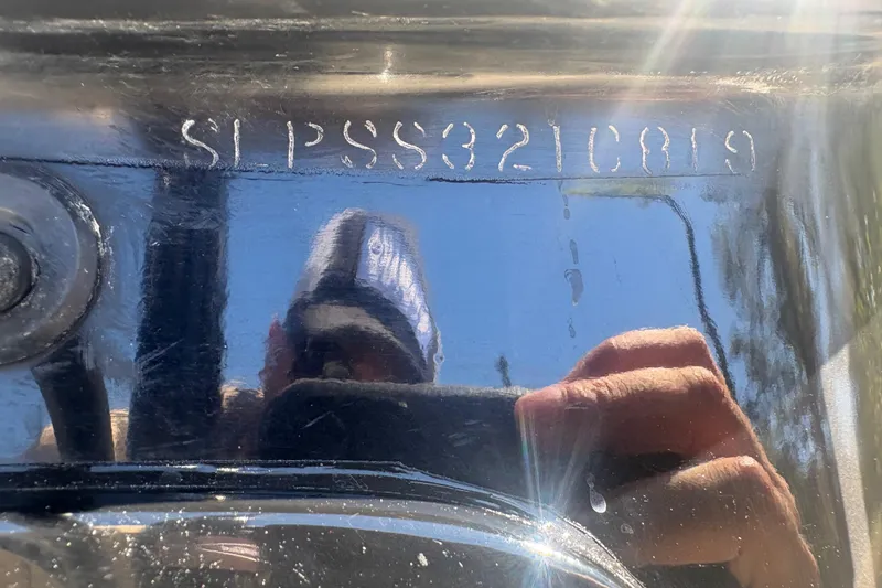 Slide: The Image of 2019 Scout 251 XSS boat engine label with specifications and serial number. - 38