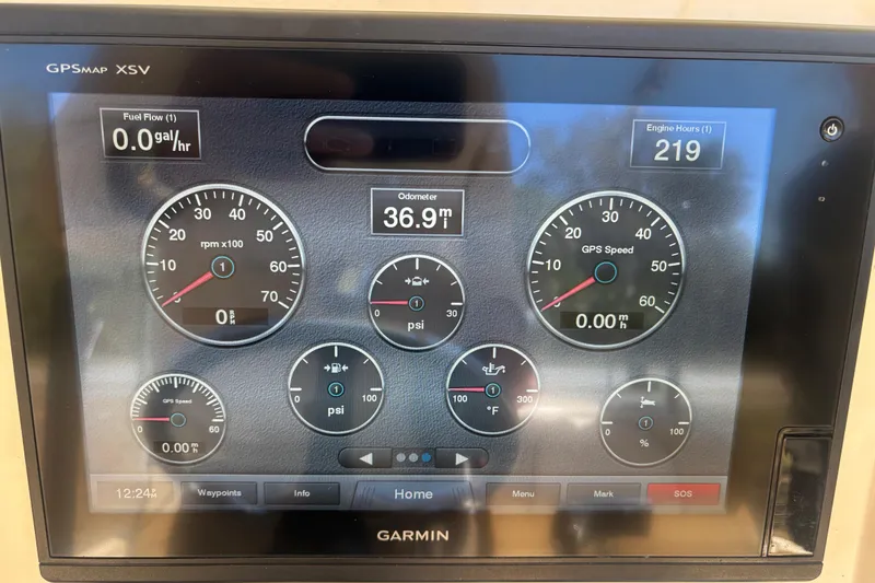 Slide: The Image of NOCO Genius GENPRO 10X4 charger in a 2019 Scout 251 XSS boat. - 40