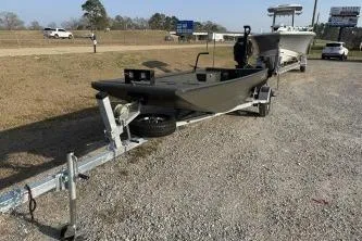 Slide: The Image of 2026 Gator Tail 1748 Gator Series boat on trailer in outdoor setting. - 3