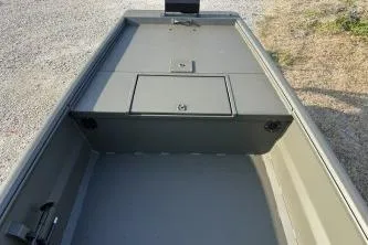 Slide: The Image of 2026 Gator Tail 1748 Gator Series boat interior with storage compartment. - 5