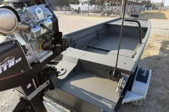 Slide: The Image of 2026 Gator Tail 1748 Gator Series boat with powerful engine, parked outdoors. - 8