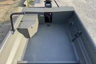 Slide: The Image of 2026 Gator Tail 1748 Gator Series boat interior with storage and control panel. - 9