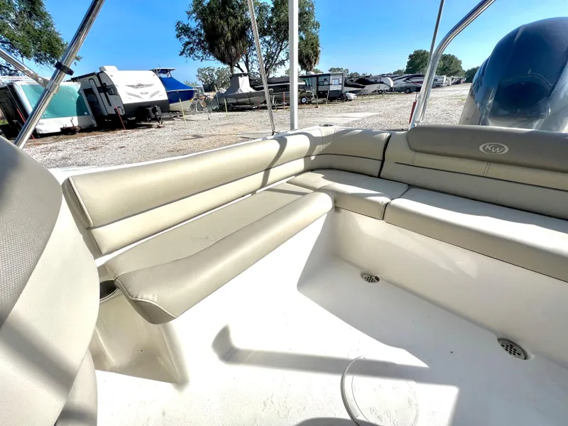 Slide: The Image of Interior of a 2021 Key West 203 DFS boat with beige seating. - 11