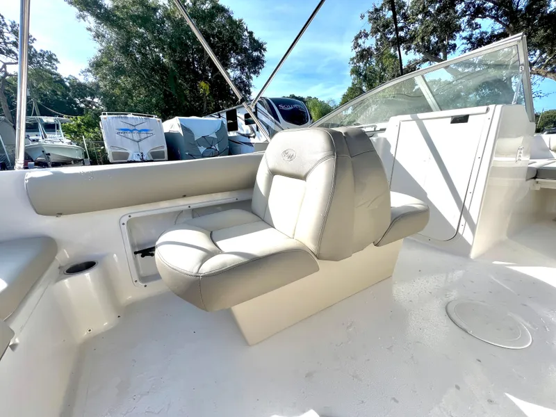 Slide: The Image of Interior of a 2021 Key West 203 DFS boat with beige seating. - 15