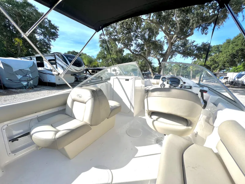 Slide: The Image of Interior of a 2021 Key West 203 DFS boat with beige seating. - 16