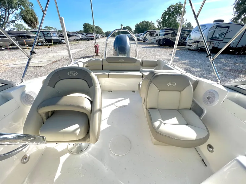 Slide: The Image of Interior of a 2021 Key West 203 DFS boat with beige seating. - 19
