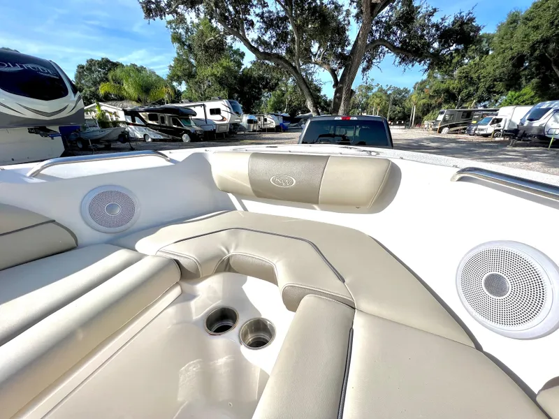 Slide: The Image of Interior of a 2021 Key West 203 DFS boat with beige seating. - 25