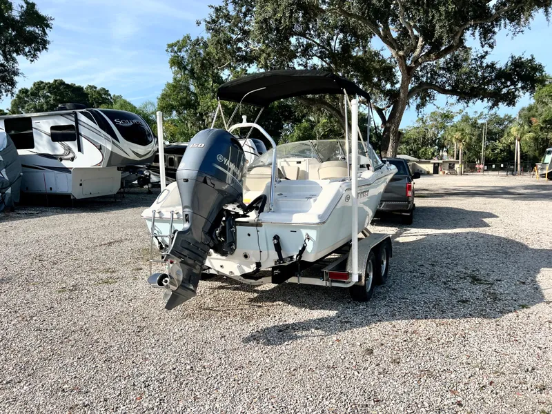Slide: The Image of 2021 Key West 203 DFS boat on trailer in parking area. - 6