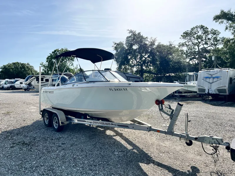 Slide: The Image of 2021 Key West 203 DFS boat on trailer outdoors. - 8