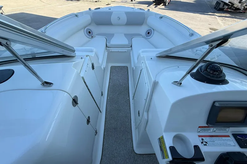 Slide: The Image of 2011 Edgewater 205CX Crossover boat interior with seating and navigation instruments. - 32