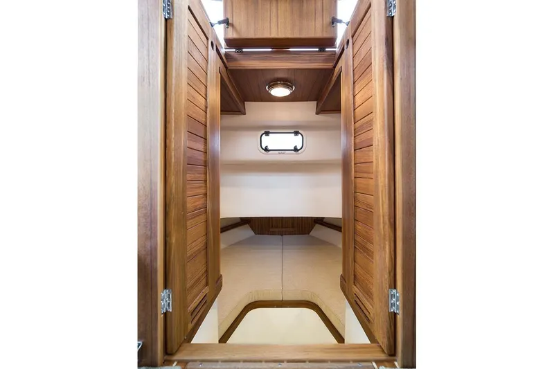 Slide: The Image of Interior of Targa 30.1 yacht, 2027 model, featuring wooden doors. - 16