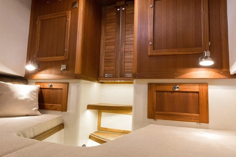 Slide: The Image of Interior of 2027 Targa 30.1 yacht with wooden cabinetry. - 18