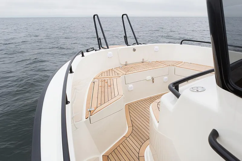 Slide: The Image of Targa 30.1 boat 2027 on calm sea, elegant design. - 6