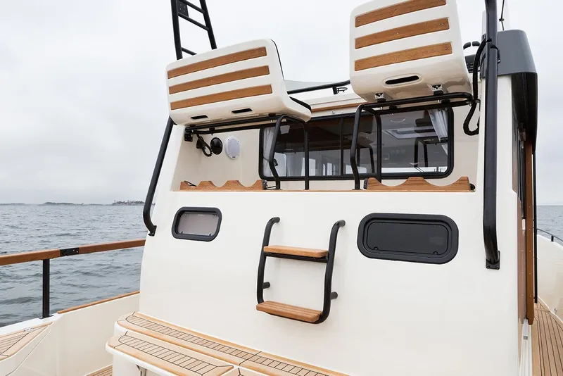 Slide: The Image of Targa 30.1 Yacht 2027 with modern design on open sea. - 7