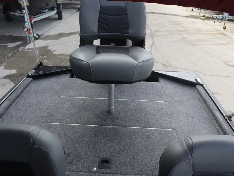 Slide: The Image of 2021 Tracker Bass Tracker Classic XL boat interior with gray seats. - 19