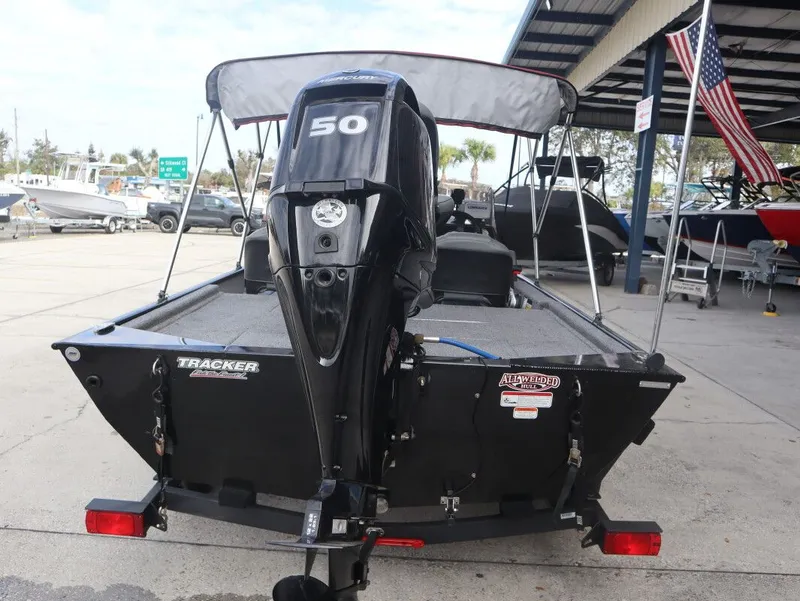 Slide: The Image of 2021 Tracker Bass Tracker Classic XL with 50 HP motor, on a trailer. - 4