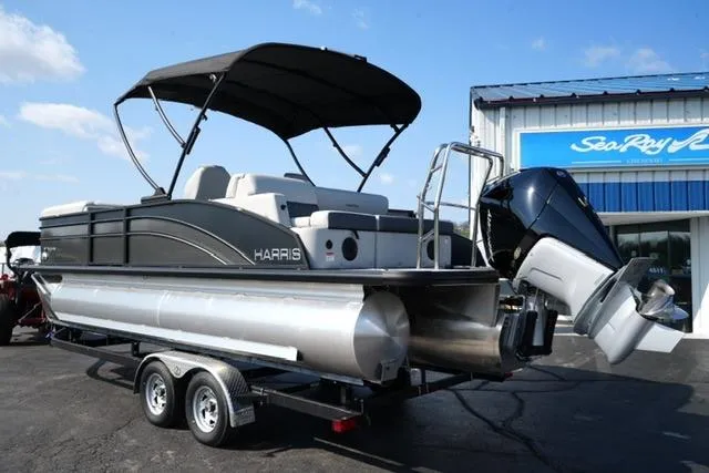 Slide: The Image of 2026 Harris Cruiser 230 SLDH pontoon boat on trailer, outdoor display. - 10