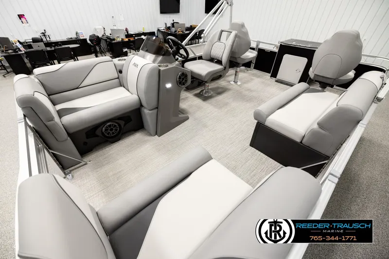 Slide: The Image of Interior view of 2026 Avalon VEN RF pontoon boat with modern seating and steering console. - 10