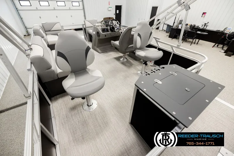 Slide: The Image of Luxurious 2026 Avalon VEN RF pontoon boat interior with modern seating and control panel. - 11