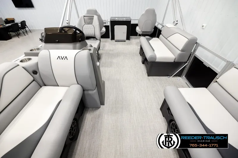 Slide: The Image of 2026 Avalon VEN RF boat interior with modern seating and steering console. - 13