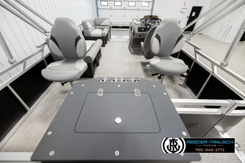Slide: The Image of Interior of 2026 Avalon VEN RF boat with modern seating and control panel. - 16