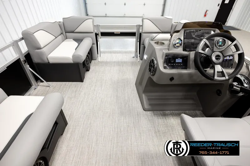 Slide: The Image of 2026 Avalon VEN RF boat interior with modern helm and comfortable seating. - 17